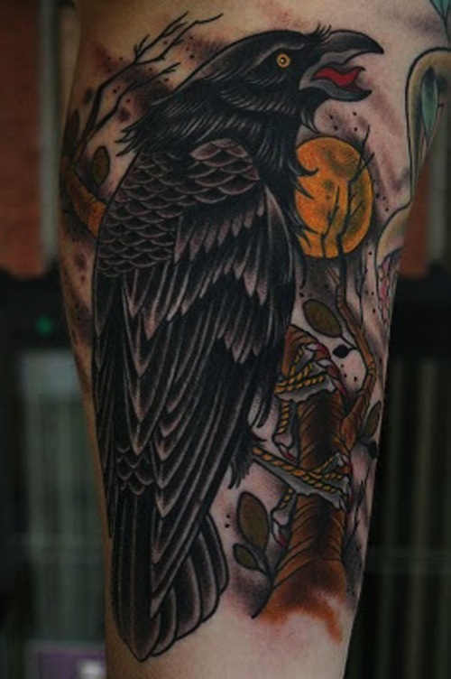 Yellow Sun And Raven Tattoo On Leg Sleeve