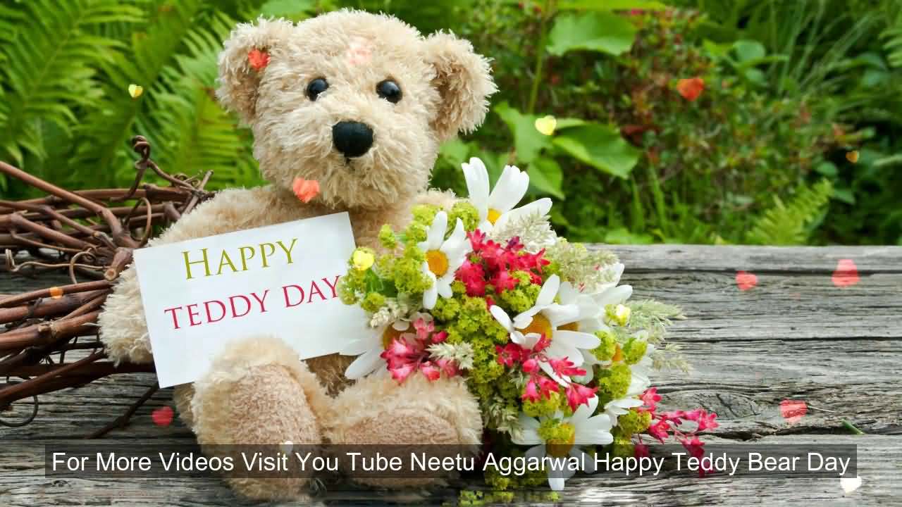 Happy teddy day teddy bear with flowers picture