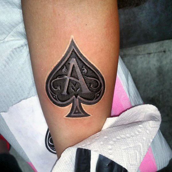 3D Carved Ace Of Spades Tattoo On Male Forearm