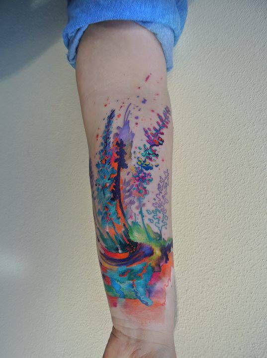 Abstract Watercolor Trees Tattoo On Left Forearm