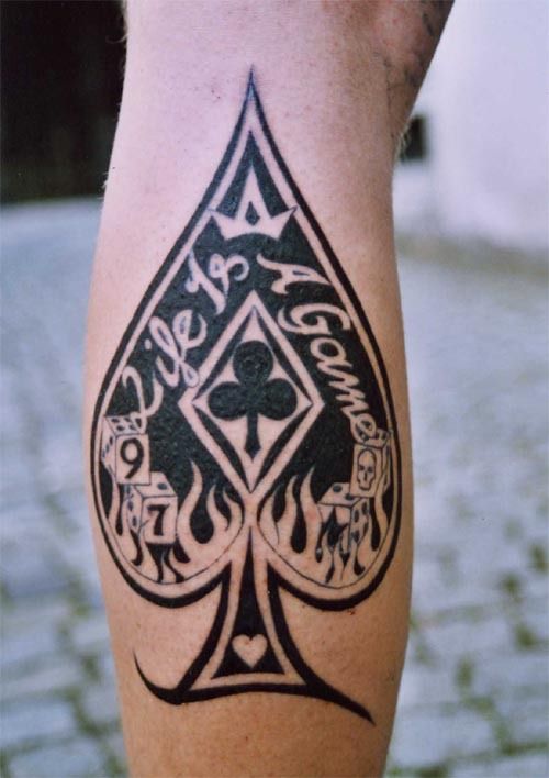 Ace Tattoo With Life Is A Game Lettering On Arm