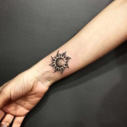 Adorable Sun Tattoo Design On Wrist