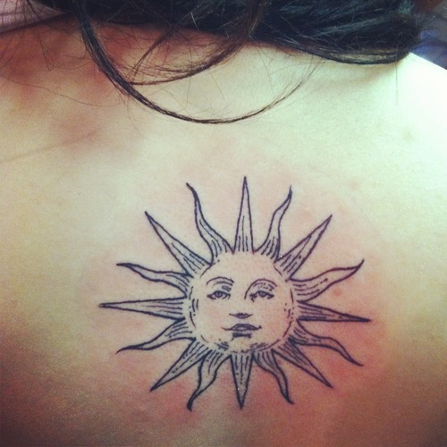 Amazing Sun Tattoo On Back