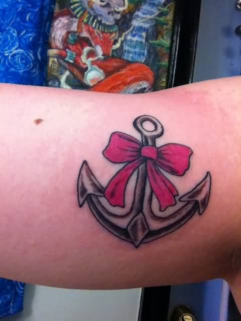 Anchor With Red Bow Tattoo On Bicep
