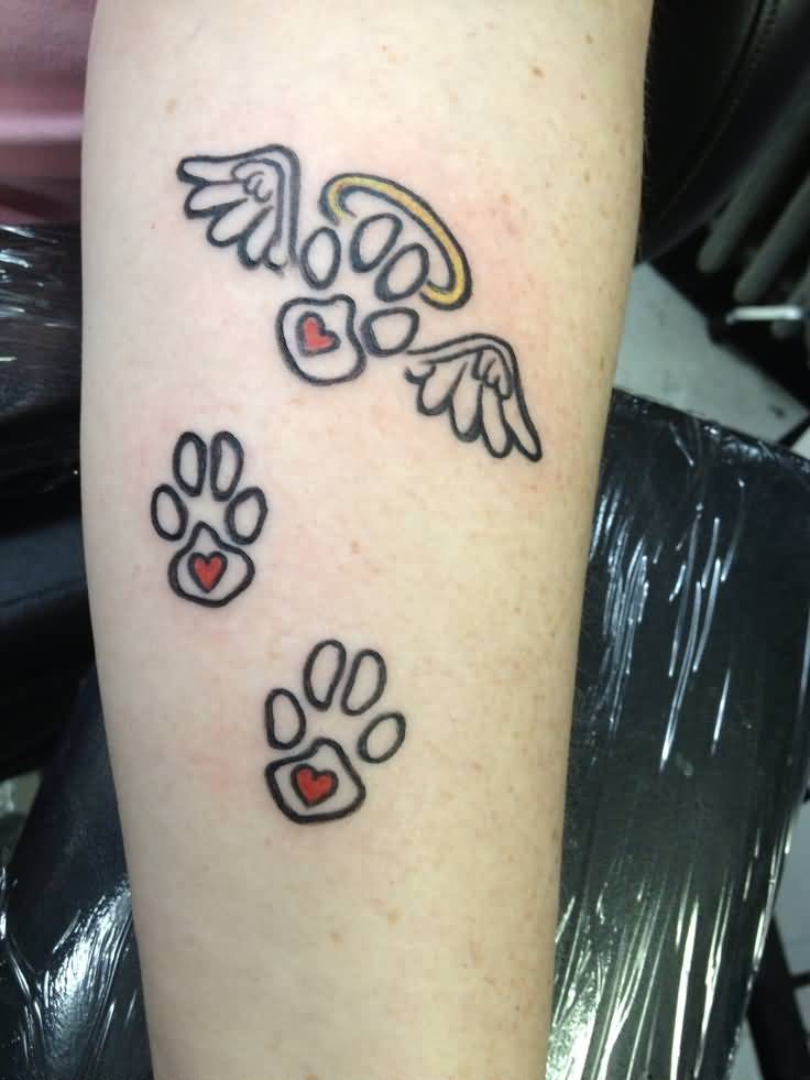 Angel Wings With Paw Print And halo Tattoo On Leg