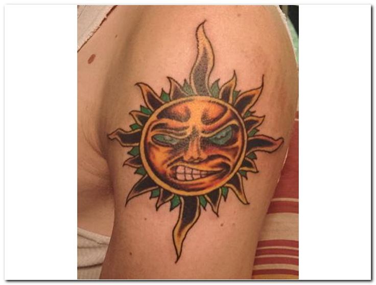 Angry Sun Tattoo On Upper arm
