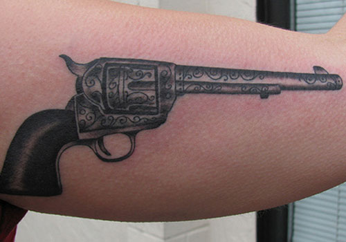 Awesome Gray Pistol Tattoo On Bicep