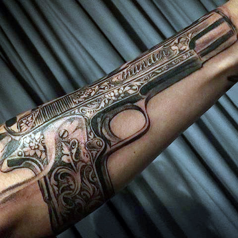 Beautiful Pistol Tattoo On Forearm