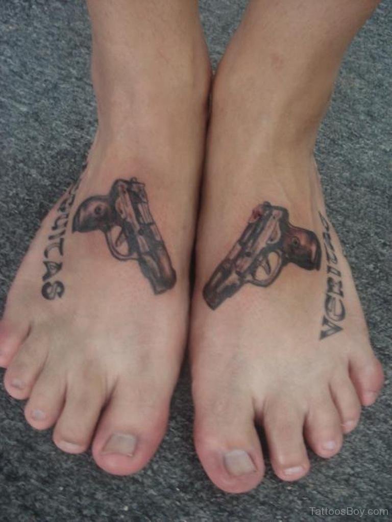 Beautiful Pistols Tattoo On Feet