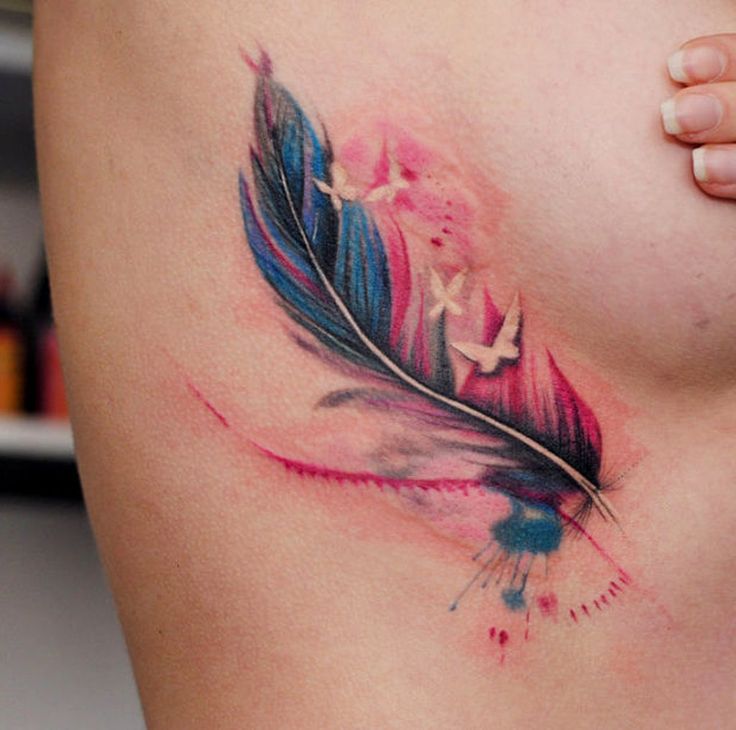 watercolor feather side tattoo