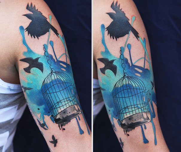 Bird And cage Watercolor Tattoo On Bicep