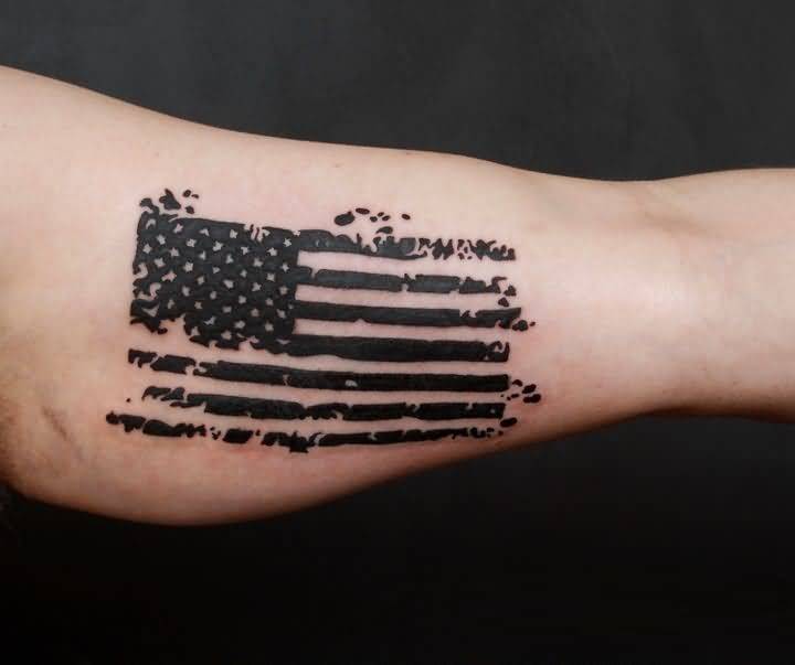 Black And Gray American Flag Military Tattoo On Forearm