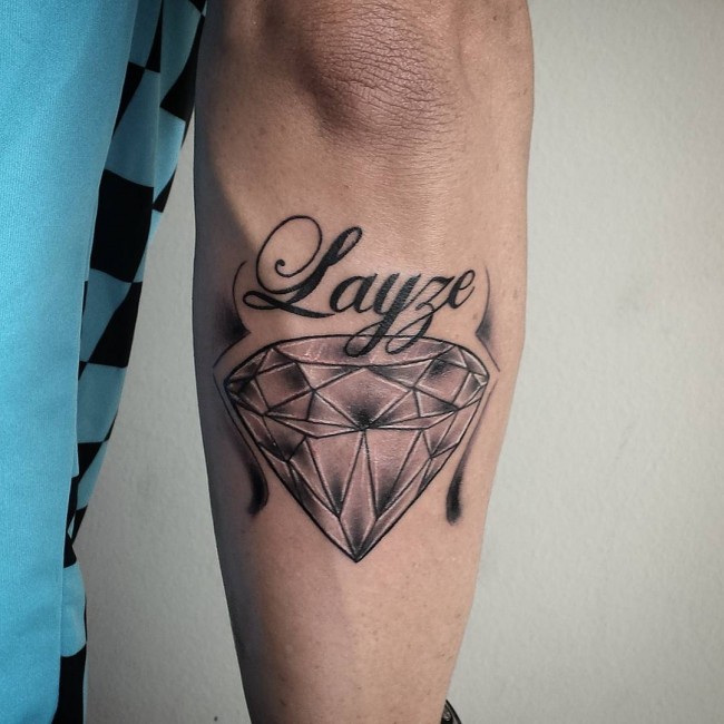 Black And Gray Diamond Tattoo On Leg