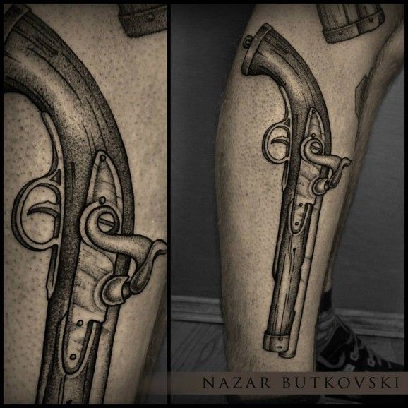 Black And Gray Pistol Tattoo Design