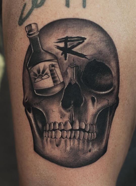 Black And gray Skull With beer Bottle On eye Tattoo