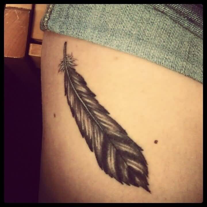 Black Feather Tattoo On Right Thigh