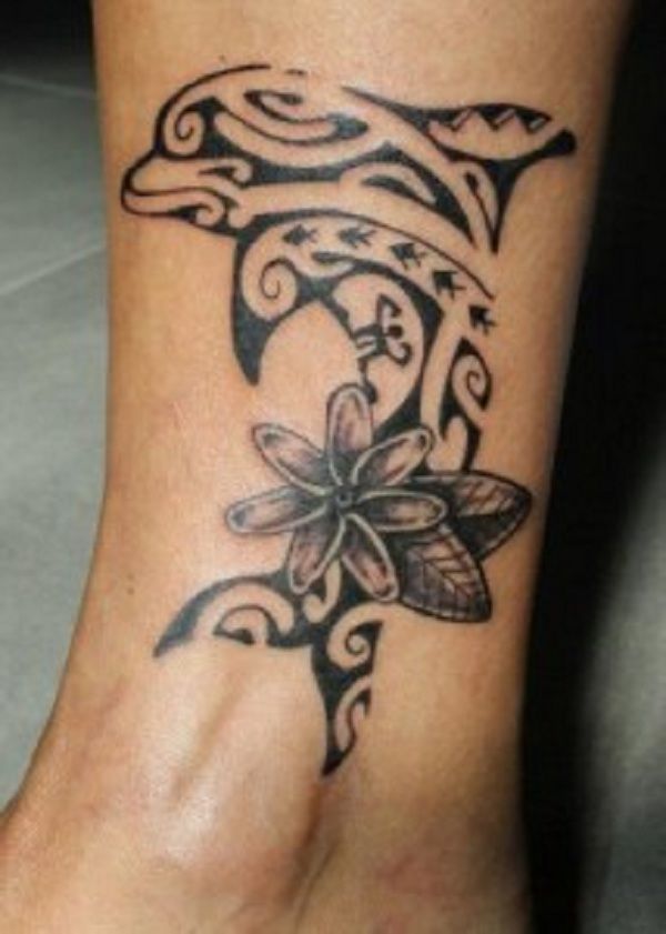 Black Ink Dolphin And Flower tattoo Design On Leg