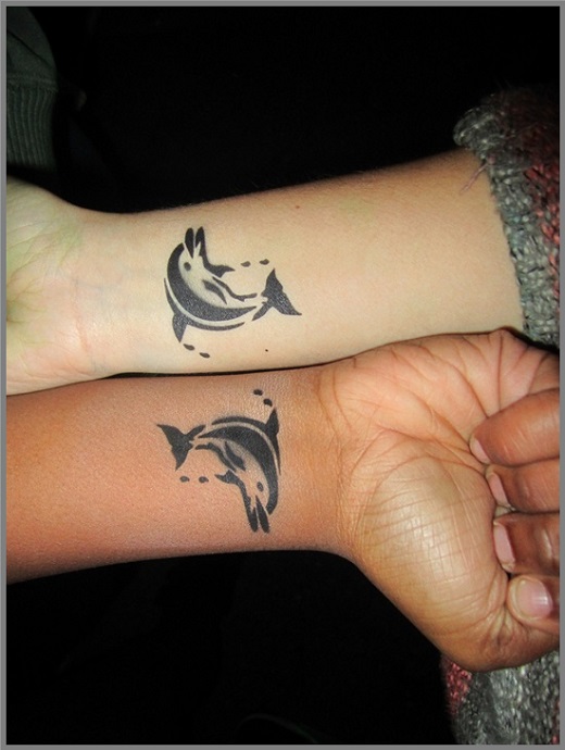 Black Ink Matching Dolphin Tattoo For Couples