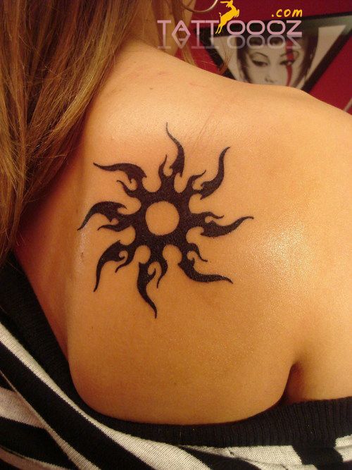 Black Ink Sun Tattoo On Back shoulder