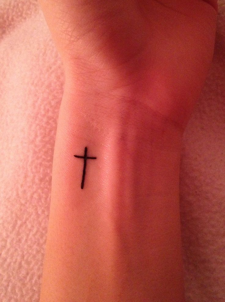 Black Minimal Cross Tattoo On Wrist