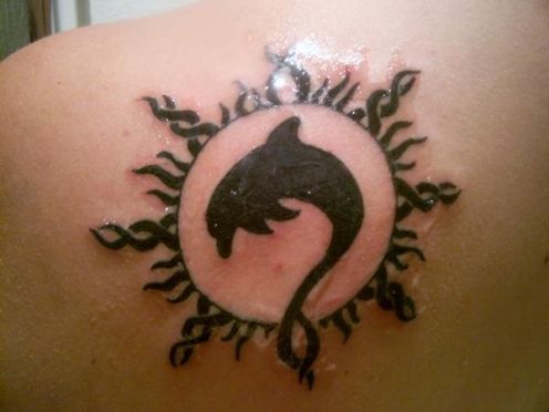 Black Silhouette Dolphin Tattoo