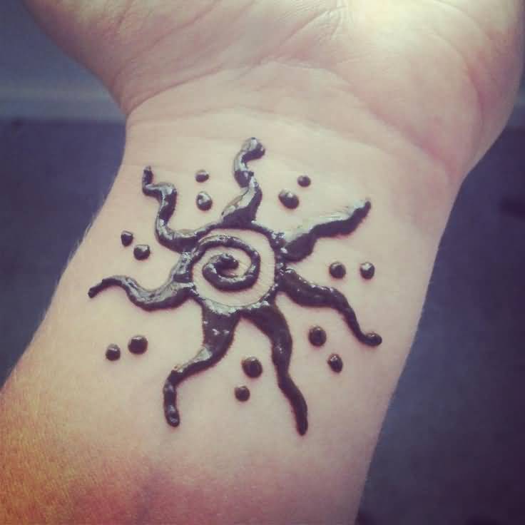 Black Simple Henna Sun Tattoo On Wrist