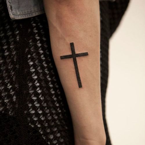 Black Simple Silhouette Cross Tattoo On Forearm