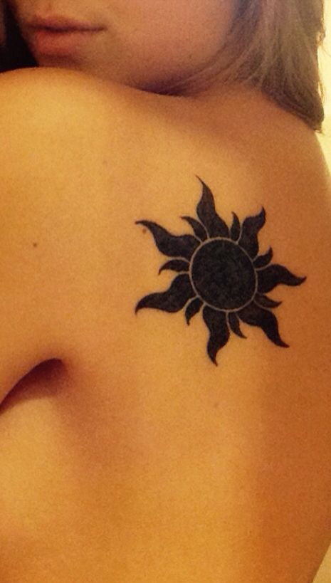 Black Sun Tattoo On Girls Back