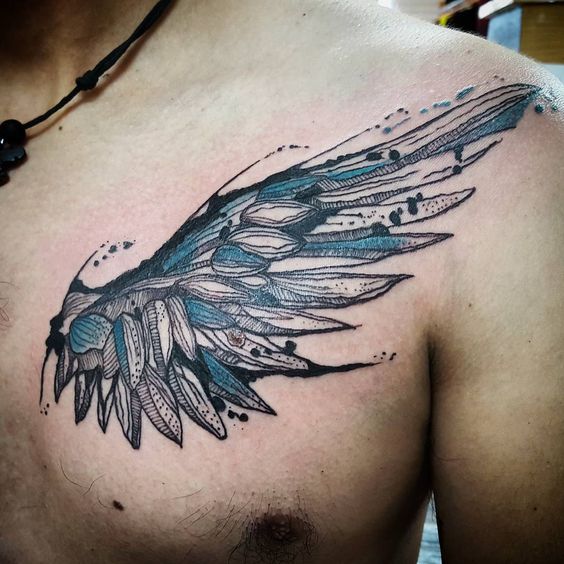Blue And White Angel Wing Tattoo On Chest