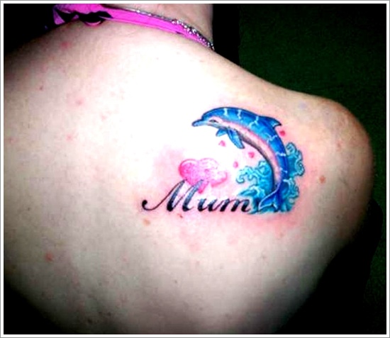 Blue Dolphin Memorial Tattoo On Girls Back Shoulder