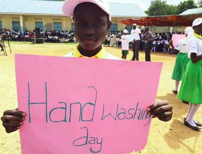 Boy Holding Handwashing Day Poster