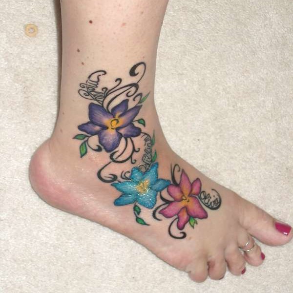 Colorful Orchid Tattoo On Foot
