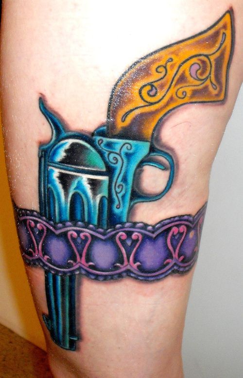 Colorful Pistol In Armband Tattoo Design