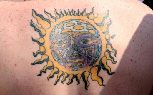 Colorful Sun Tattoo Design idea