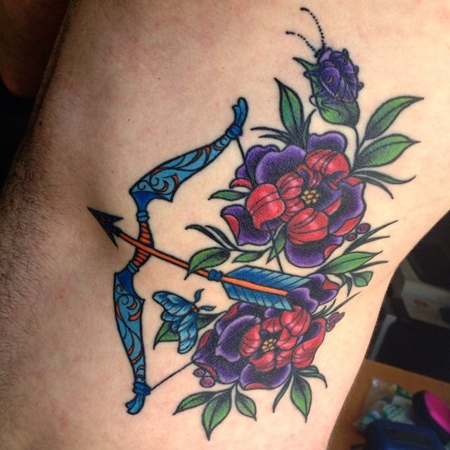 Colorful bow And Arrow Tattoo with Flowers