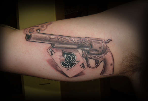 Colt Pistol And Ace Of Spade Card Tattoo On Bicep