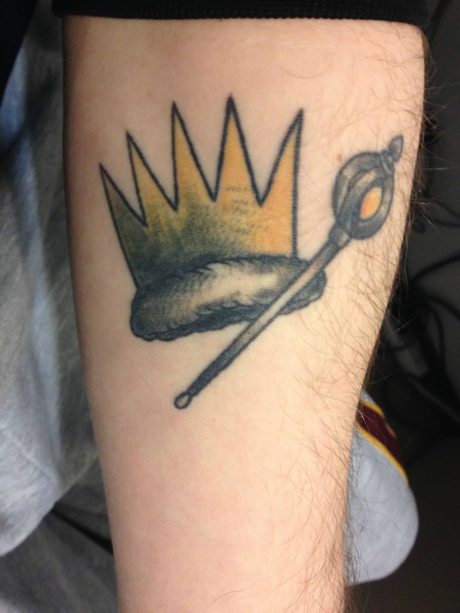 Crown And Stick Tattoo On Leg