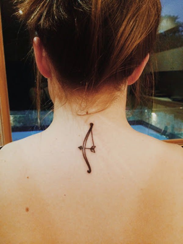 Cute Bow And Arrow Tattoo On Girls Back