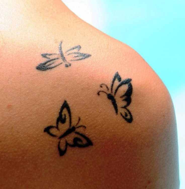 Cute Tiny Butterfly Tattoo On Shoulder