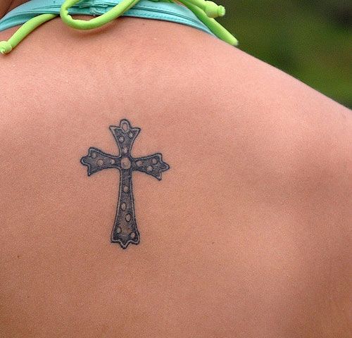 Dainty Cross Tattoo On Girls Back