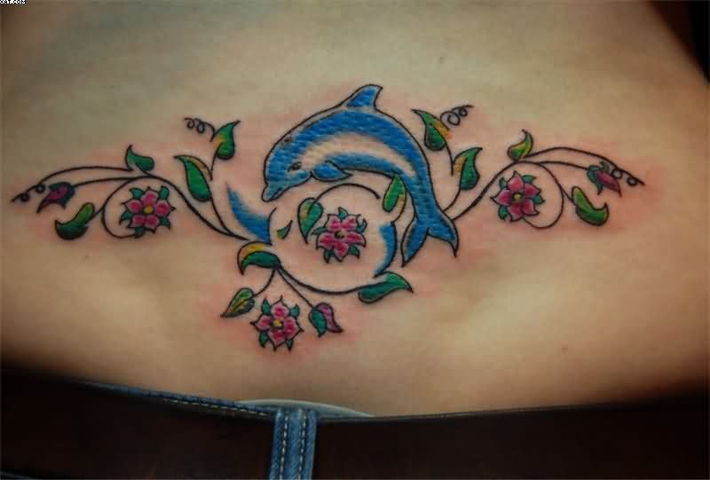 Dolphin And Flowers Tattoo On Waist
