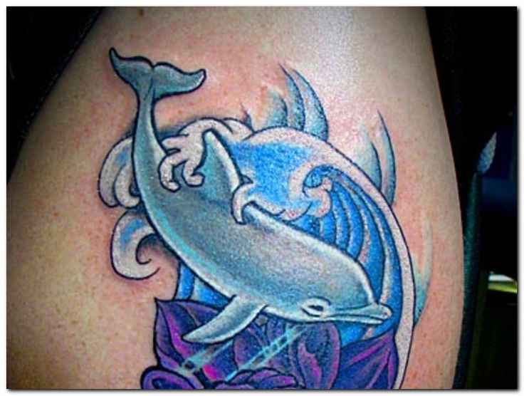 Dolphin With Water Wave Tattoo Design