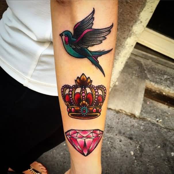 Flying Bird Diamond And Colorful Crown Tattoo On Forearm
