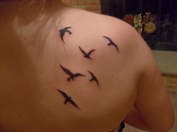 Flying Birds Tattoo On Girls back