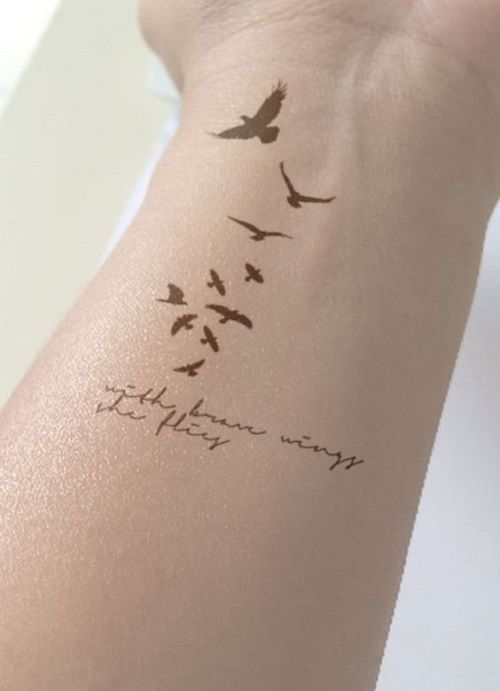 Flying Birds Tattoo With Quote On Wrist