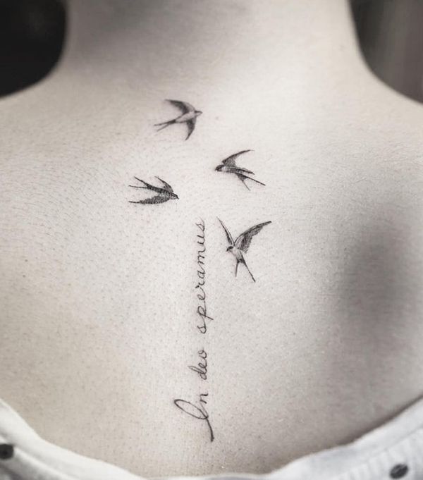 Flying Birds With Lettering Tattoo On Back