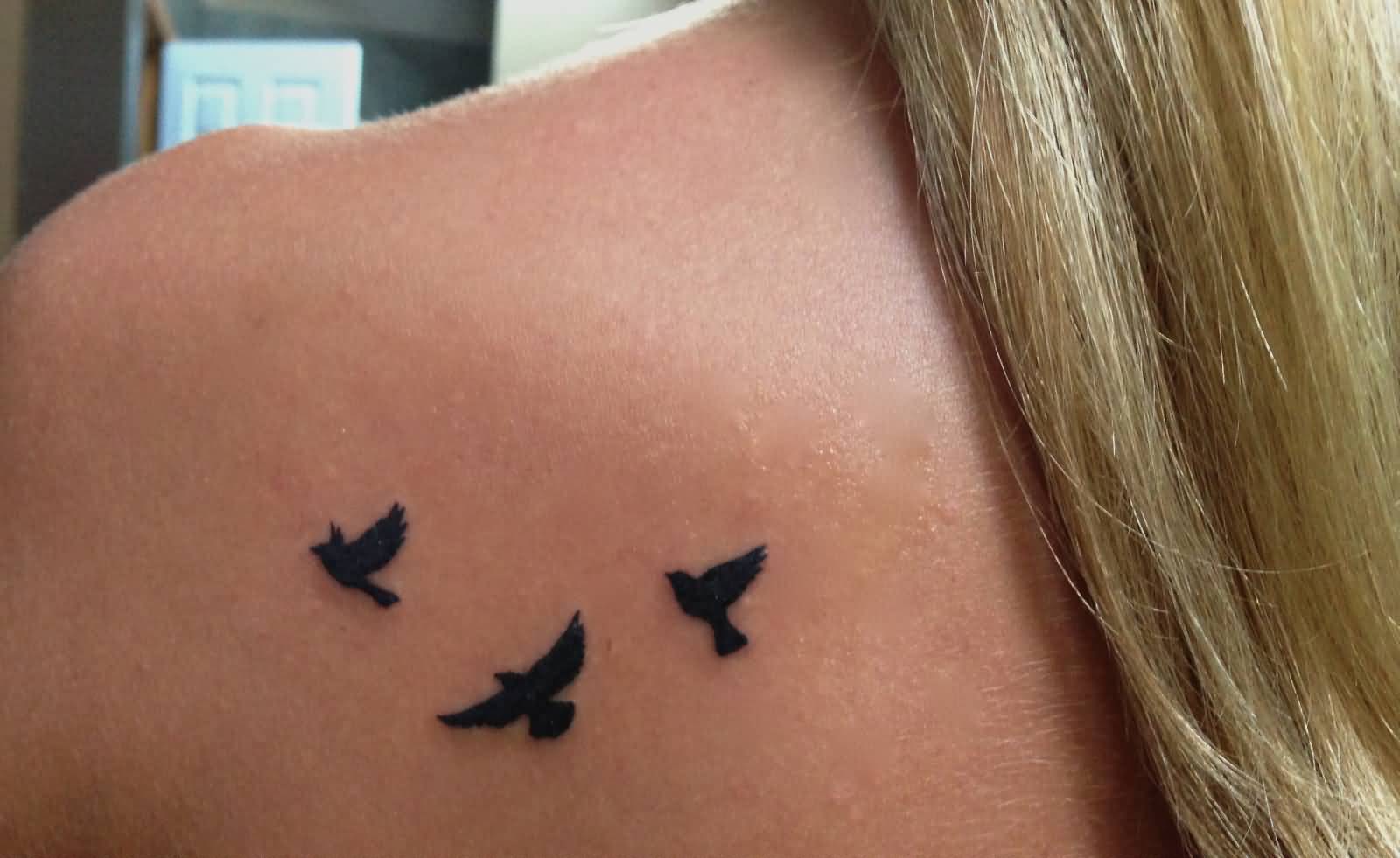 Flying Silhouette Black Birds Tattoo On Girls Back