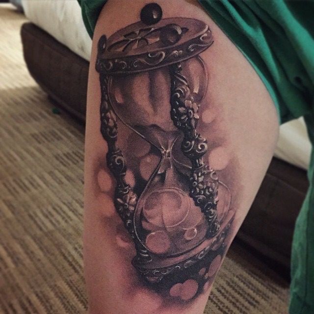 Gray Hourglass Tattoo On Thigh