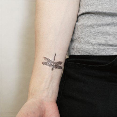 Gray Ink Dragonfly Tattoo On Forearm