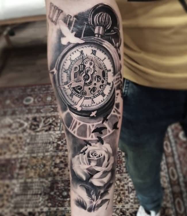 Gray Ink Hourglass Tattoo On Forearm